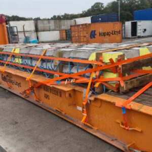 OOG concrete bridge section secured to 40ft flat rack for shipment to Dakar Senegal